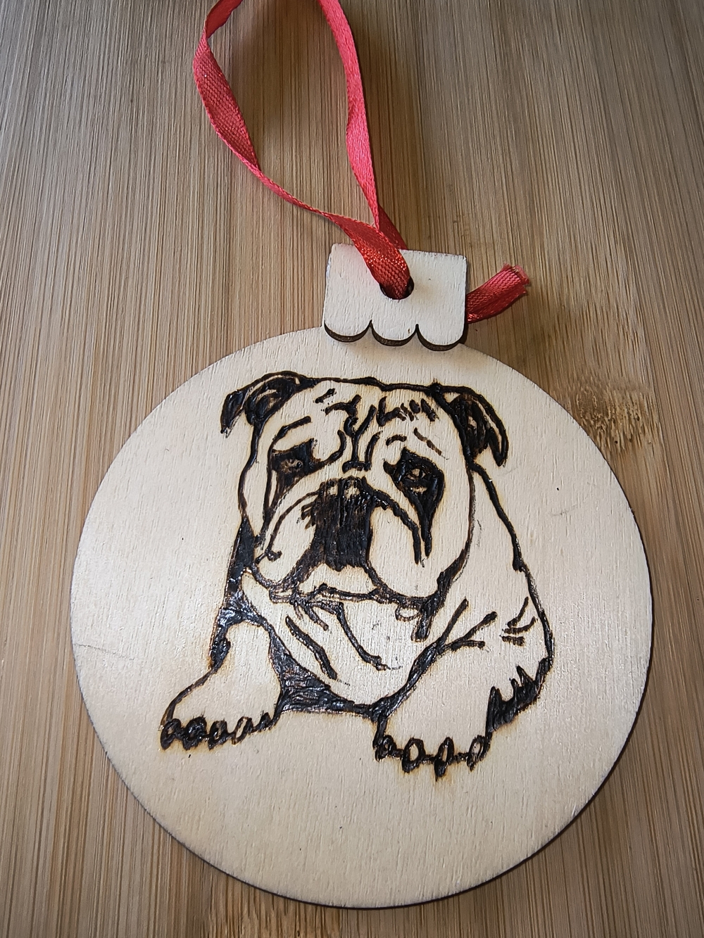 Hand Crafted Wooden Bulldog Ornament with Red Ribbon